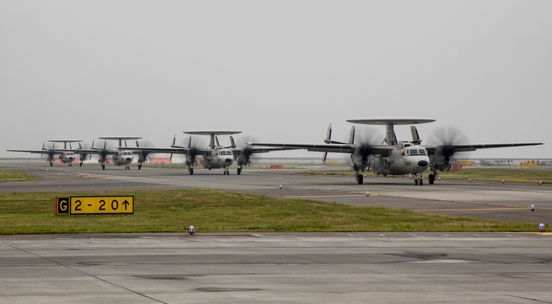 E-2D Advanced Hawkeye aircraft with Carrier Airborne Early Warning Squadron (VAW) 125 taxi down the flight line upon return to Marine Corps Air Station Iwakuni, Japan, August 9, 2017 (U.S. Marine Corps photo by Cpl. Aaron Henson)